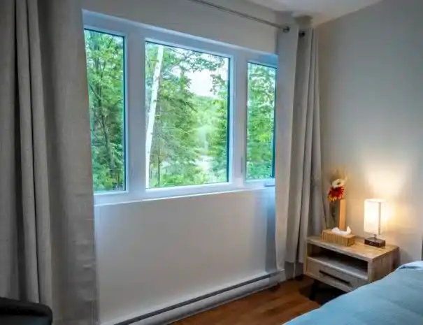 Chalet haut de gamme avec expérience thermale complète à St-Côme dans Lanaudière - Chambre avec lit queen au 2e